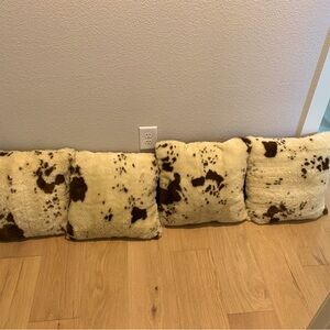 Set of 4 faux cowhide pillows EUC no flaws like new